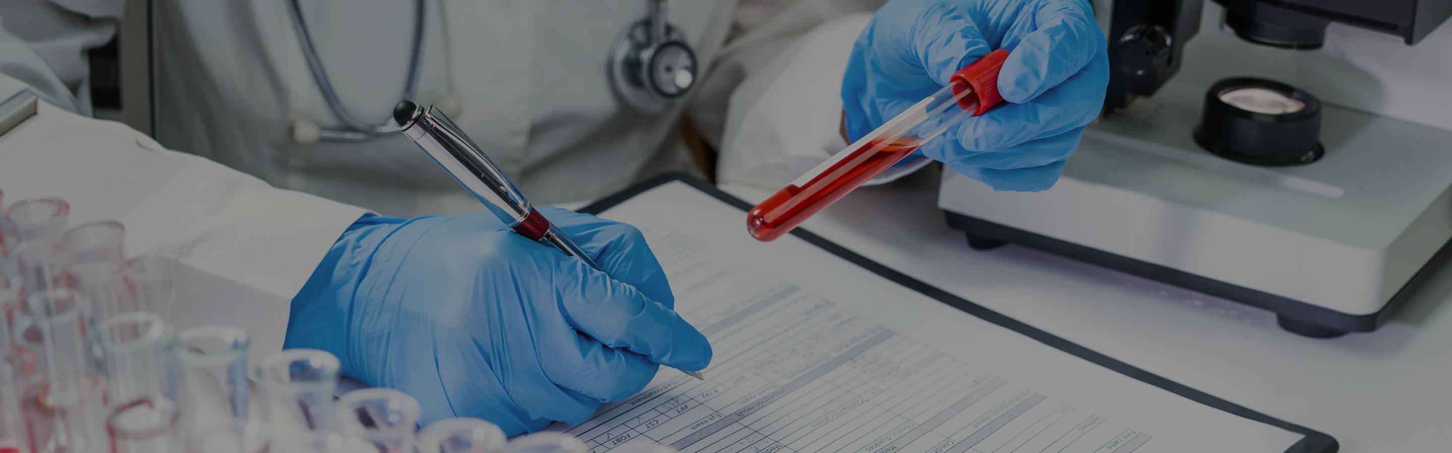 Healthcare professional holding blood collection tubes representing research on blood NAD+ levels, NAD+ decline, and aging.