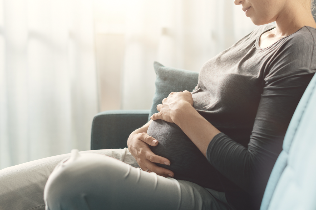 Pregnant woman representing CD38-driven NAD+ decline in human placenta.
