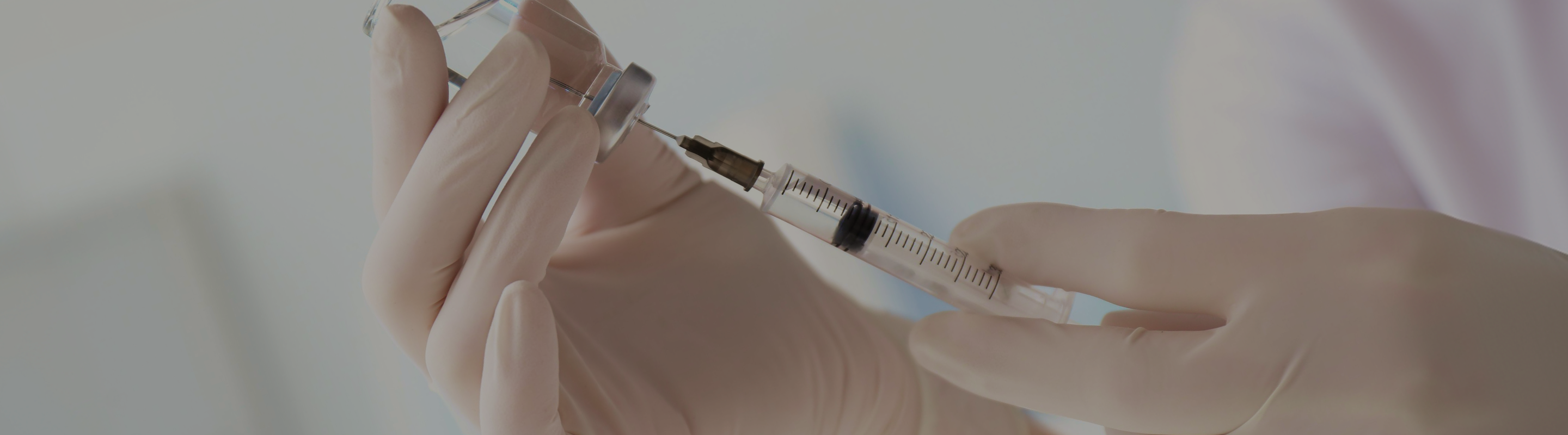 Syringe and vial representing NAD+ and nicotinamide riboside (NR) subq and IM injections.