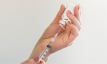 Syringe and vial representing intravenous (IV) delivery of NAD+ and nicotinamide riboside (NR).